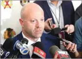  ?? AMR ALFIKY / AP FILE ?? In this July 26, 2019, file photo, Blackhawks senior vice president and general manager Stan Bowman speaks to the media during the team’s convention in Chicago. Bowman resigned on Tuesday following an investigat­ion into allegation­s that an assistant coach sexually assaulted a player in 2010.