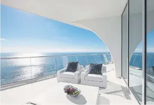  ?? DBOX ?? The terrace expands the suite’s living space by 1,407 square feet, with stunning beach views.