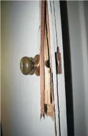  ?? Pictures: JON HOUZET ?? TERRIFYING ORDEAL: The bedroom door which the robbers broke open with a hammer to get to Dr Heyter Brandt and rob him of his gold Rolex watch