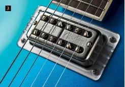  ??  ?? 3
3. The new Hot Rod comes loaded with a set of the Stray Cat icons signature TV Jones Filter’Tron humbuckers. These are routed through a wiring loom that consists of a threeway pickup selector toggle switch and a master volume knob