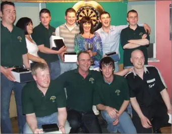  ??  ?? The Greyhound team after beating Maguires in the 2009 Division 2 Cup decider.