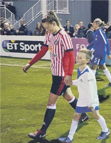  ??  ?? Above: Sunderand Ladies and Chelsea Ladies walk onto the pitch at Mariners Park at a recent encounter. Is it the