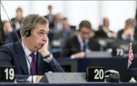  ?? AP PHOTO/JEAN-FRANCOIS BADIAS, FILE ?? In this file photo dated Wednesday, Jan.17, 2018, former U.K. Independen­ce Party leader and MEP Nigel Farage listens to speeches at the European Parliament in Strasbourg, eastern France. According to an article written by Farage and published Saturday Aug. 18, 2018, Farage says he is joining up with a pro-Brexit pressure group to oppose Britain’s Prime Minister Theresa May’s plan for future ties with the European Union.