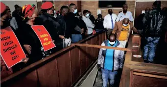  ?? OUPA MOKOENA African News Agency (ANA) ?? THE three men accused of murdering Hillary Gardee, Mduduzi Gama, Philemon Lukhele and Sipho Mkhatshwa, leave the dock after abandoning their bail applicatio­n at the Nelspruit Magistrate’s Court. |