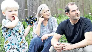  ??  ?? Ben Magid, his mother, Christine, and four-year-old son, Ray, live in the same house