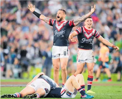  ?? Photo / Getty Images ?? Roosters prop Jared Waerea-Hargreaves celebrates his side’s grand final victory last night.