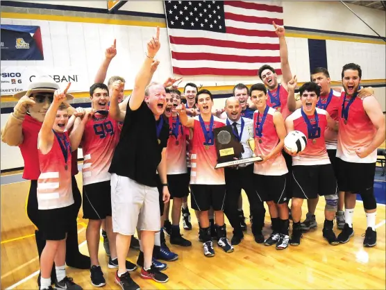  ?? Photo by Ernest A. Brown ?? Members of the Mount St. Charles boys' volleyball team are all smiles after capturing the Division I state championsh­ip on Saturday night at Johnson &amp; Wales University's Wildcat Center. The Mounties defeated Bishop Hendricken in four games en route to the program's first-ever D-I crown.