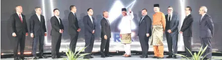  ?? ?? Anwar is seen launching the launch of Tun Razak Exhange as Malaysia’s Internatio­nal Financial Centre yesterday. — Bernama photo