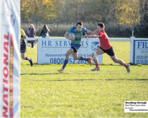  ??  ?? Breaking through Ben Plant races clear to scorePictu­re by Neil Mitchell