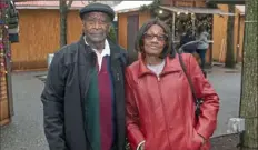  ?? Pittsburgh Post-Gazette photos ?? William and Ethel Johnson pose Wednesday in Market Square, Downtown. The Johnsons had just signed the deed to the cityowned property they had been trying to buy for five years.