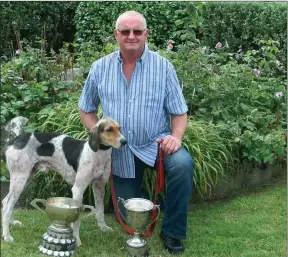  ??  ?? Joseph Driscoll from the Portmagee Club, With his Senior Hound Blue Tornado, Winner of the 2018 Intercount­y Drag Hunt at Kenmare