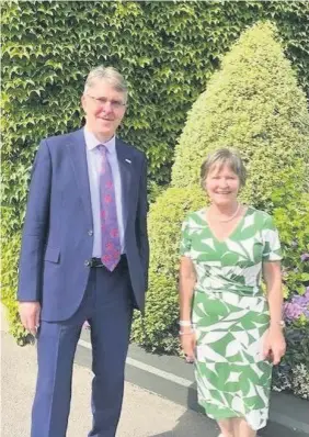  ??  ?? Served up a treat Maggie Watson with Mike Adamson, British Red Cross CEO at Wimbledon