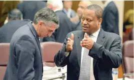  ??  ?? Ald. Roderick Sawyer ( right, with Ald. Ricardo Munoz) at a February meeting.