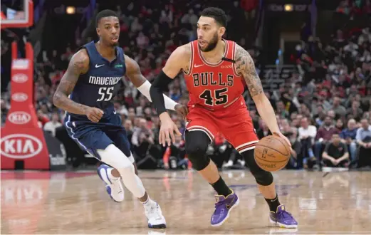  ?? PAUL BEATY/AP ?? Denzel Valentine (driving past the Mavericks’ Delon Wright this month) is unsatisfie­d with how the Bulls have used him and likely will leave in the offseason.