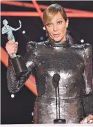  ?? VINCE BUCCI/INVISION/AP ?? Allison Janney accepts the award Sunday for outstandin­g performanc­e by a female actor in a supporting role for I, Tonya at the 24th annual Screen Actors Guild Awards.