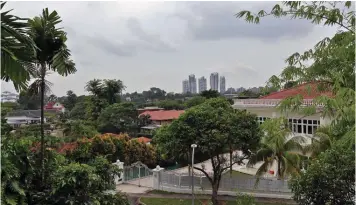  ?? SAMUEL ISAAC CHUA/THE EDGE SINGAPORE ?? View of Queen Astrid Park and Coronation Road West GCB estate from a balcony on the second level of the house