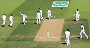  ??  ?? Breakthrou­gh: England captain Joe Root walks off disconsola­tely (left) after being run out two short of his fifty; (right) Sam Curran plays through the offside on his way to an unbeaten 37 as England gained the upper hand