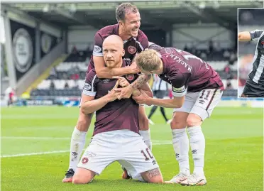  ??  ?? Liam Boyce celebrates his goal with Andy Halliday and Gary Mackay-steven