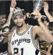  ?? Jeff Haynes AFP/Getty Images ?? A TWO-TIME most valuable player, Tim Duncan helped the San Antonio Spurs win five NBA titles.