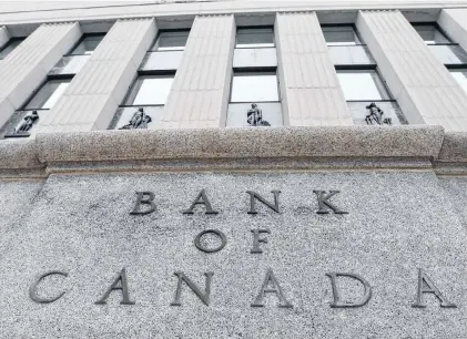  ?? CP PHOTO ?? The Bank of Canada is seen in 2017 in Ottawa. A Bank of Canada deputy governor says the effects of U.S. trade unknowns, lower oil prices and weaker housing and consumer spending are behind the recent decelerati­on in the country’s economic growth.