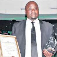  ??  ?? Best Field Ranger and winner of the Magqubu Ntombela Award - Thulani Zulu of the St Lucia antipoachi­ng unit