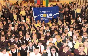 ??  ?? Great sports Pupils and staff at Airdrie’s Victoria Primary School welcomed the sportscotl­and accreditat­ion