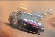  ?? NASCAR/GETTY Images - Jared C. Tilton ?? Alex Bowman drives around the dirt track at Bristol Motor Speedway during a practice round Friday.