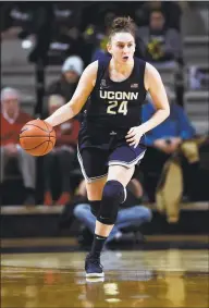  ?? Mark Zaleski / Associated Press ?? UConn guard Anna Makurat plays against Vanderbilt during the second half of a women’s NCAA basketball game on Wednesday in Nashville, Tenn.