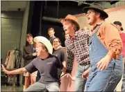  ?? Kristina Wilder / Rome News-Tribune ?? Chris Morgan (from left), Max Rampley and Brice Green rehearse a cowboy number during “Crazy For You,” the Floyd County Schools’ upcoming countywide musical.