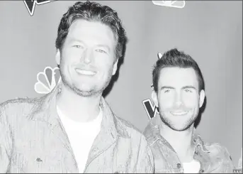  ??  ?? Blake Shelton and Adam Levine