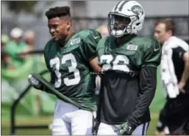  ?? THE ASSOCIATED PRESS ?? Jets safeties Marcus Maye, right, and Jamal Adams walk together during training camp in Florham Park on Monday.