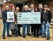  ?? SUBMITTED PHOTO — SAFE BERKS ?? Members of Heaven’s Thunder Band of Boyertown visited Safe Berks on Jan. 28 and delivered a check for nearly $4,200 to help renovate the Playground. From left, band members Randy Graber, Janelle and Guy Detweiler, Mark Malizzi, Keith Morris; Safe Berks...