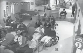  ??  ?? Brian Sinclair, top right in wheelchair, is shown in surveillan­ce footage at the Winnipeg Health Sciences Centre in September 2008. He died after waiting 34 hours in the emergency room. Judge Tim Preston issued a report Friday following an inquest...