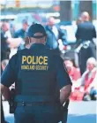  ?? FREDERIC J. BROWN, AFP/GETTY IMAGES ?? Police arrest demonstrat­ors protesting immigratio­n enforcemen­t in Los Angeles.