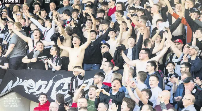  ??  ?? We did it Fans celebrate a win in the derby with Morton