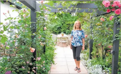  ??  ?? Judith Macneil in her and husband Warren’s Te Puke garden, which is part of the 2018 BOP Garden &amp; Art Festival.