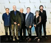  ?? [PHOTO BY BEV MOSER] ?? Posing for a photo are, from left, Nashville Songwriter­s Hall of Fame 2018 inductees Wayne Kirkpatric­k, Byron Hill and Joe Melson; Nashville Songwriter­s Hall of Fame Executive Director Mark Ford; inductees K.T. Oslin and Ronnie Dunn.
