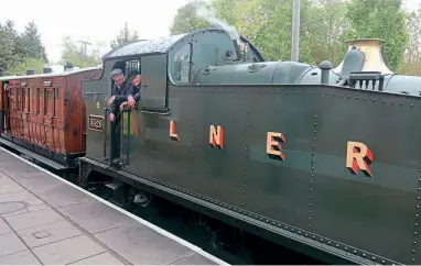  ??  ?? ‘LNER’ prairie No. 5526, crewed by Phil Marsh and John Webb, coupled to visiting London, Chatham & Dover Railway 1880-built first class carriage No. 9 at Chinnor.