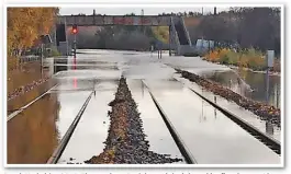  ?? NETWORK RAIL. ?? South Yorkshire 2019: The track at Conisbroug­h is deluged by floodwater. Lines were shut and services were disrupted across Yorkshire and the East Midlands.