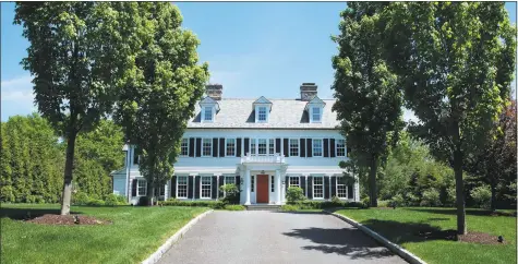  ?? Houlihan Lawrence / Contribute­d photo ?? The six-bedroom, 10-bath Connecticu­t colonial at 751 Lake Ave., Greenwich, is listed by Houlihan Lawrence for $7.495 million.