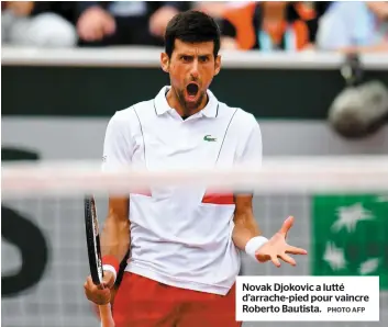  ??  ?? Novak Djokovic a lutté d’arrache-pied pour vaincre Roberto Bautista.