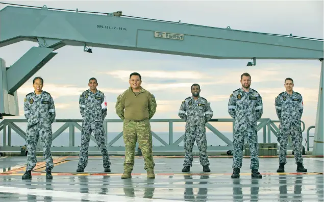  ?? Photo: Australian Defence Force. ?? Australian Defence Force personnel on board the HMAS Adelaide.
From left: Leading Seaman Michelle Vocea, Lieutenant Commander Roneel Chandra, Trooper Tuilakepa Fakraufon, Able Seaman Koloba Vuniwaqa, Petty Officer Lee Addison and Seaman Douglas Miller.