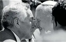  ?? PHOTOS: STUFF ?? Pope John Paul II is invited to hongi before a celebrator­y mass being held at Auckland Domain in his honour.