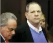  ?? JEFFERSON SIEGEL — NEW YORK DAILY NEWS VIA AP ?? Harvey Weinstein, right, appears at his arraignmen­t with his lawyer Benjamin Brafman, in Manhattan Criminal Court on Friday in New York.
