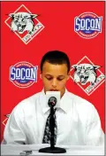  ?? JEFF SINER/TRIBUNE NEWS SERVICE ?? Stephen Curry pauses during a news conference where he announced his intent to forego his senior year at Davidson College in 2009.