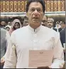  ??  ?? The former cricketer and parliament­arian takes the oath of office.