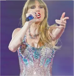  ?? AP PHOTO/TORU HANAI ?? Singer-songwriter Taylor Swift performs Feb. 7 during the “Lover” portion of the “Eras Tour” at the Tokyo Dome.