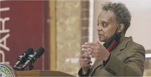  ?? TYLER LARIVIERE/SUN-TIMES ?? Mayor Lori Lightfoot said Monday that a child having a gun “happens way too often in our city.”