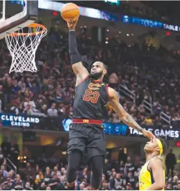  ?? TONY DEJAK/ AP ?? LeBron James had 46 points and 12 rebounds and the Cavaliers held off the Pacers on Wednesday to even their first- round series at 1- 1.