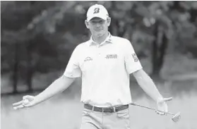  ?? STREETER LECKA/GETTY IMAGES ?? Brandt Snedeker reacts after hearing thunder on the seventh green during the third round of the Wyndham Championsh­ip at Sedgefield Country Club on Saturday.